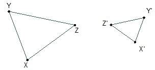 △xyz was reflected over a vertical line, then dilated by a scale factor of , resulting in △x'y'z'. w