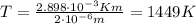 T=\frac{2.898 \cdot 10^{-3} Km}{2\cdot 10^{-6} m}=1449 K