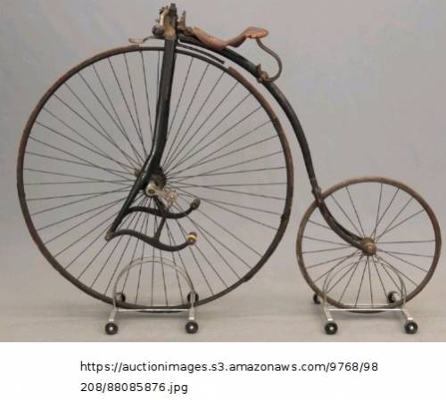 An old-fashioned bicycle has two differently sized wheels. the circumference of the front wheel is 9