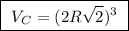 \boxed{ \ V_C = (2R \sqrt{2})^3 \ }