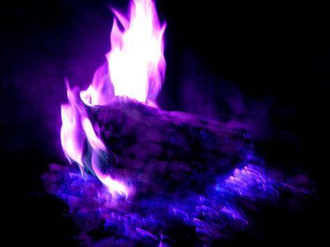 Acertain unknown compound burns with a violet flame. what metal is present in the unknown compound?