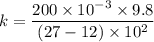 k=\dfrac{200\times10^{-3}\times9.8}{(27-12)\times10^{2}}