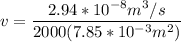 v = \dfrac{2.94*10^{-8}m^3/s}{2000(7.85*10^{-3}m^2)}