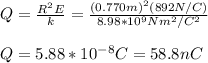 Q=\frac{R^2E}{k}=\frac{(0.770m)^2(892N/C)}{8.98*10^9Nm^2/C^2}\\\\Q=5.88*10^{-8}C=58.8nC