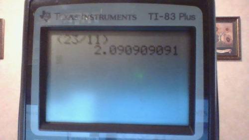 What is 23/11 in decimal form with an explanation