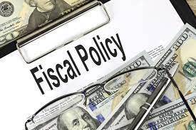 Which situation most directly illustrates a possible outcome of a fiscal

policy?
A. New environment