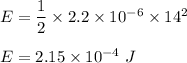 E=\dfrac{1}{2}\times 2.2\times 10^{-6}\times 14^2\\\\E=2.15\times 10^{-4}\ J