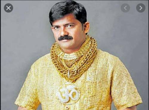 1.who is known as the gold man of india. who can answer i will give his a top up​