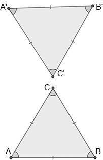 Based on the markings of the two triangles, what statement could be made about ΔABC and ΔA′B′C′? Que