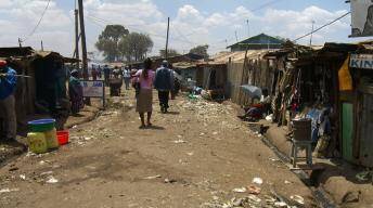 The above image shows Kibera, a neighborhood in one of Africa’s largest cities. What types of infras