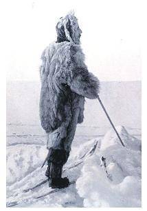 ILL MAKE YOU BRAINLIEST Look at the text feature. A man wearing layers of fur while standing in ice.
