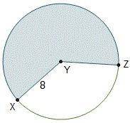 The measure of central angle XYZ is 1.25 radians. Circle Y is shown. Line segments X Y and Z Y are r