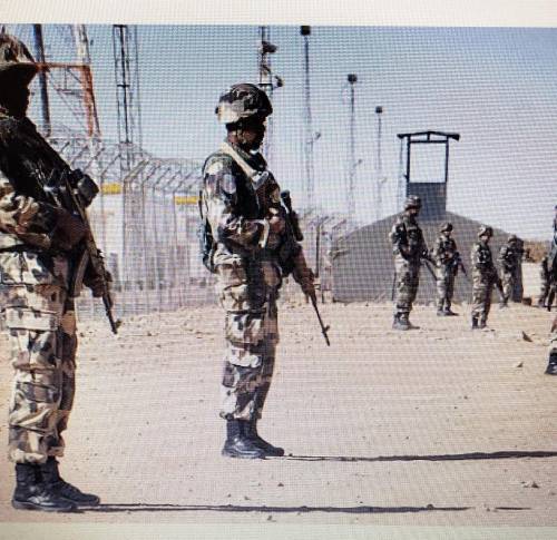 2. This is an gas power plant in Algeria. Discuss why it might be surrounded bysoldiers.