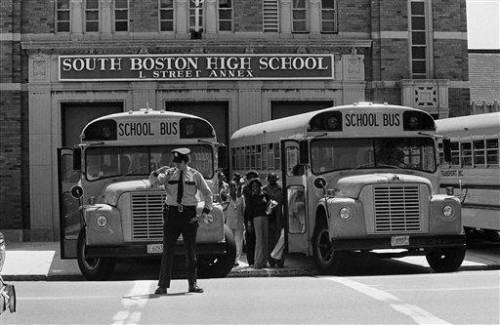 Look at the photo and read the text. Then, answer the question. On May 30, 1974, buses lined up lik