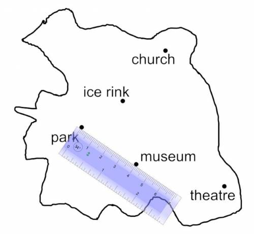 Here is a map of a town.

The map shows a centimetre ruler.
1 cm represents 3 km.
What is the real