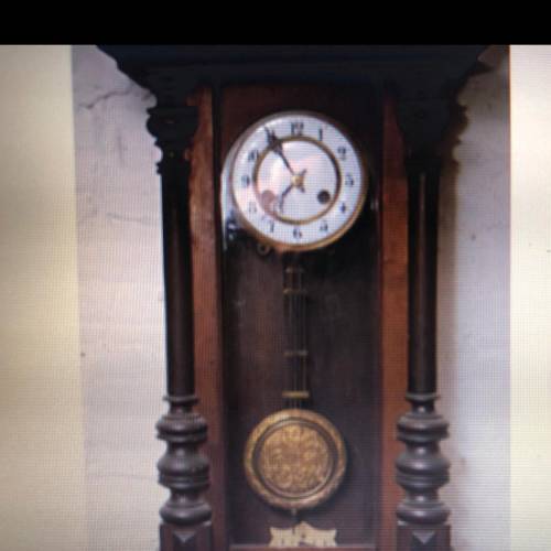 Assume that the pendulum clock shown is a closed system. Which statement describes evidence that th