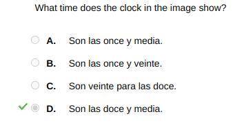 What time does the clock in the image show?

A. Son las once y media.
B. Son las once y veinte.
C.