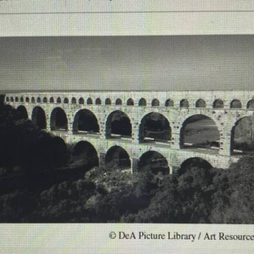 The Roman aqueduct in France (pictured above) is an example of which concept?

A) religious syncre