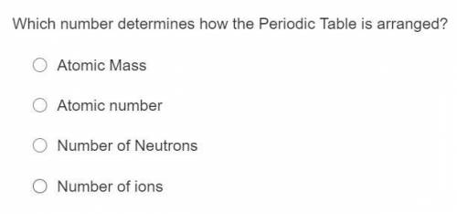 Which number determines how the Periodic Table is arranged?