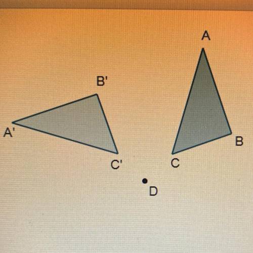 Examine the rotation. Which best describes point D?

А
O angle of rotation
O center of rotation
B'
