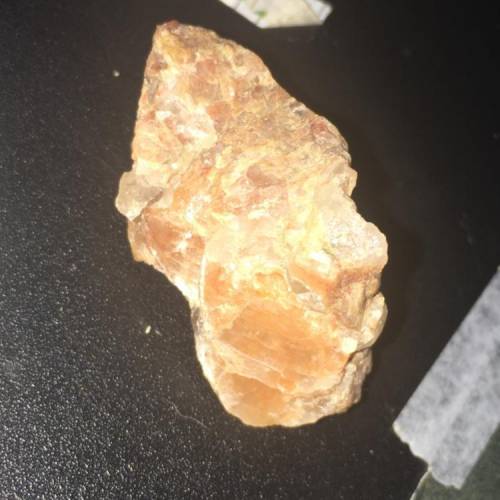 this isnt even for school- can anyone identify what kind of rock this is for me? it has clear parts