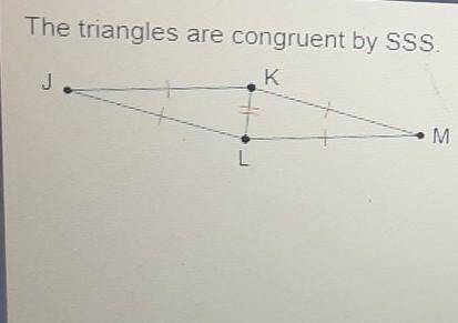 Which transformation(s) can be used to map one triangle onto the other? Select two options reflecti