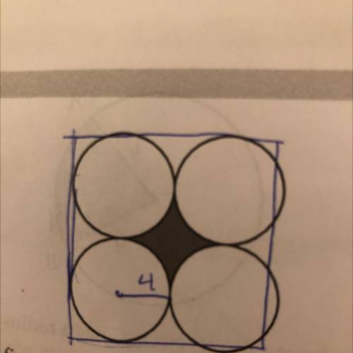 In the figure above, four circles, each with radius

4, are tangent to each other. What is the are