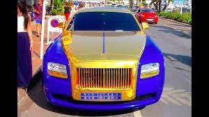 WHICH CAR IS BETTER
THE BLUE AND GOLD ONE IS A ROLLS ROYCE
THE BLUE ONLY ONE IS A MCLAREN