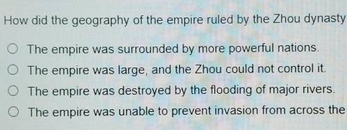How did the geography of the empire ruled by the Zhou dynasty contribute to the dynasty's downfall?