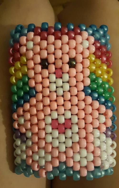 Just alittle art project i did for myself. this is a care bear Kandi cuff. what do you think?
