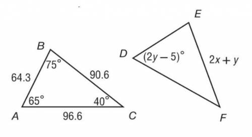 In the diagram, Δ ABC ≅ Δ DEF. Find the values of x and y.
