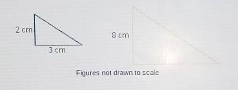Consider the original triangle and the scale drawing enlargement. What is the scale factor?