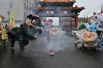 The photo shows a Chinese New Year celebration in Seattle.

Which statement is true about this are