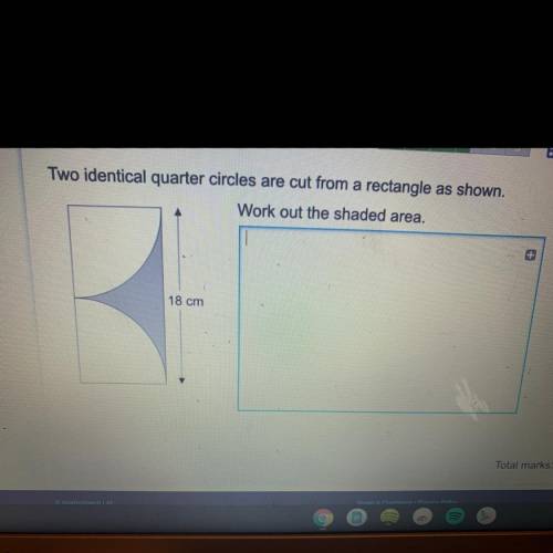 Two identical quarter circles are cut from a rectangle as shown.

Work out the shaded area.
18 cm