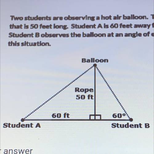 Two students are observing a hot air balloon. The balloon is attached to the ground by a rope that