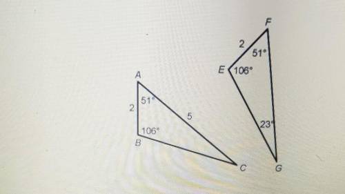 1. Do the two triangles have the same size and shape? Justify your answer. Write your answer in the