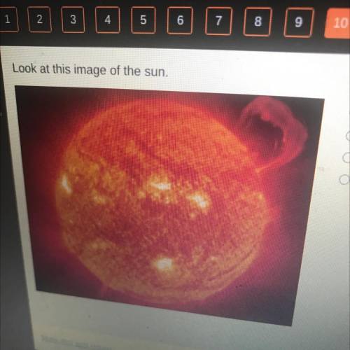Look at this image of the sun.

This image helps readers better understand the sun by
O showing th