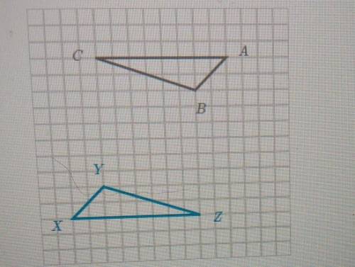 Triangles XYZ and ABC are congruent. The side length of each square on the grid is 1 unit.

Which