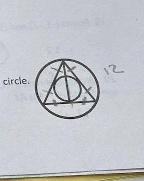 In the diagram to the right, a circle is inscribed in a regular triangle inscribed in a bigger circ