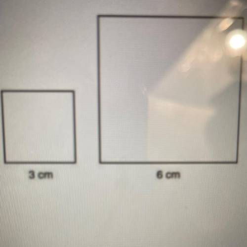 What is the ratio of the side length of the smaller square to the side length of the larger square?