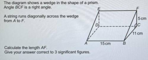 The diagram shows a wedge in the shape of a prism