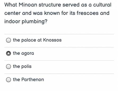What Minoan structure served as a cultural center and was known for its frescoes and indoor plumbin
