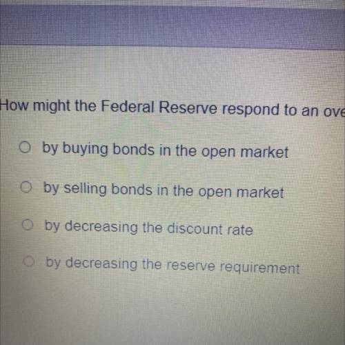 How might the Federal Reserve respond to an overheated economy or boom?